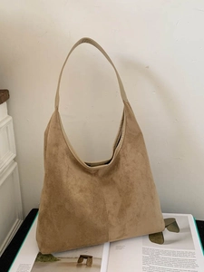 Large khaki suede hobo bag with wide shoulder strap for everyday work and commuting