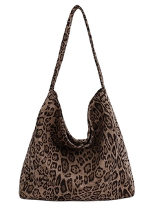 Spacious leopard print tote bag with thick canvas texture and casual shoulder strap style