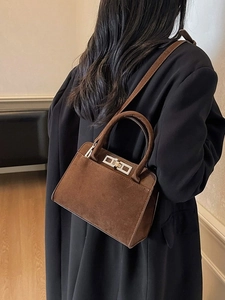 Minimalist dark brown suede tote bag with gold buckle for women in daily use