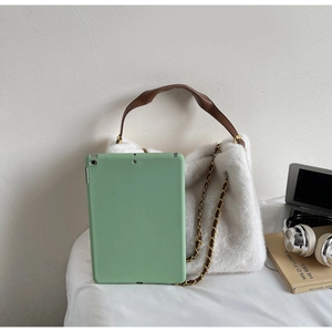 Spacious white plush shoulder bag shown with an iPad to illustrate large capacity and size