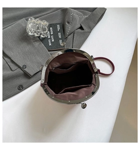 Top view of retro burgundy frame bag showing interior compartments and wide opening