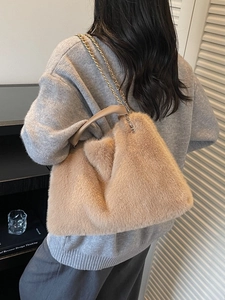 Retro faux fur shoulder bag with chain strap and top handle in light brown color