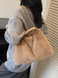 Chic khaki faux fur shoulder bag with plush texture and stylish gold chain strap