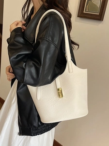 Fashionable off-white tote bag with textured leather and gold buckle for women