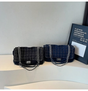 Detailed comparison of dark grey and navy denim quilted shoulder bags with metal chain straps