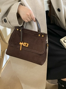 Retro dark brown suede flap bag with gold turn-lock and contrast stitching details