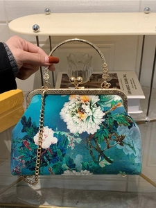 Elegant Chinese retro floral handbag with teal blue peony print and round metal handles