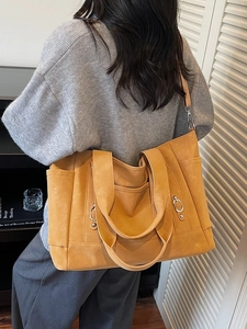 Retro mustard yellow tote bag made of matte leather for women commuting in style