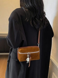 Vintage brown suede crossbody box bag for women with a cute silver robot pendant detail