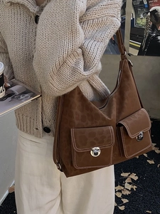 Vintage brown leopard pattern suede tote bag with dual front pockets and contrast stitching