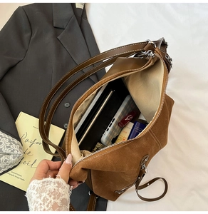 Interior view of brown suede tote bag showing large capacity for essentials