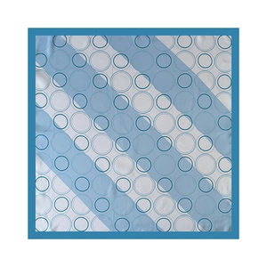 Close-up of French style silk scarf with blue geometric stripes and polka dot patterns