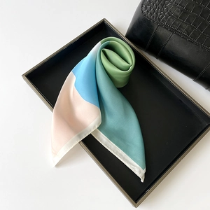 Detailed view of art oil painting style silk square scarf with geometric patchwork pattern