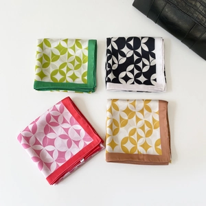 Satin square scarves with vintage geometric prints in four colors with a fashion handbag