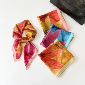Satin floral print square scarf shown in multiple vibrant colors on a white background