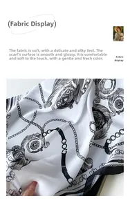 Detailed close-up of silk scarf with baroque chain prints and smooth glossy fabric texture