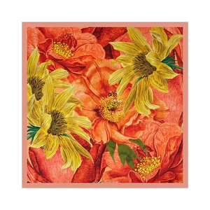 Detailed close-up of sunflower and peony floral print on a satin square scarf