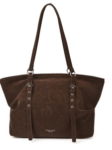 Minimalist deep brown leather tote bag with silver rings and shoulder straps on white background