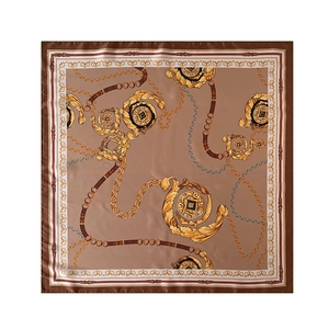 Detail of faux silk scarf featuring golden chains and classic equestrian leather belt print