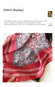 Macro shot showing the smooth satin texture and red Paisley pattern of this silk scarf