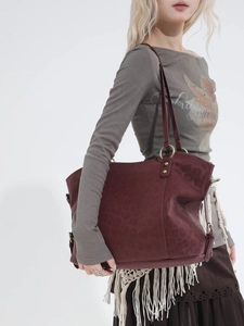 Large burgundy suede tote bag with leopard embossing and golden metal rings for women