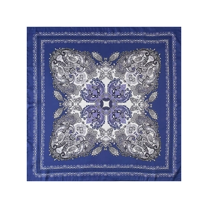Flat lay detail of a dark blue paisley square scarf with symmetric patterns and silk texture