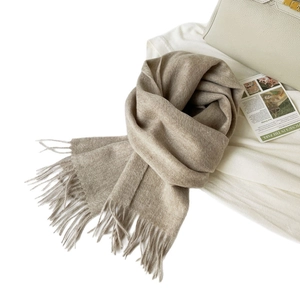 Premium Australian wool scarf in oatmeal beige with fringe detail and soft texture