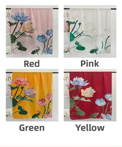 Detailed display of four silk-like scarves with lotus floral prints in various colors