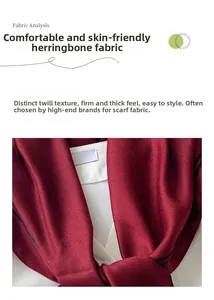 Detail shot of elegant dark red herringbone fabric scarf with visible twill texture