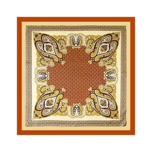 Flat lay detail of a satin square scarf featuring complex paisley floral patterns and border
