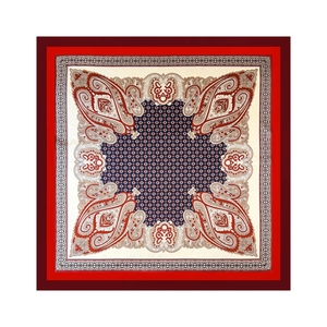 Close-up of paisley pattern and geometric polka dots on large square satin scarf