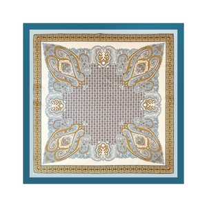 Detailed flat lay of 90cm paisley silk scarf featuring vintage gold and navy royal patterns
