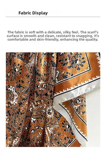 Detail of rolled edges and paisley pattern on high-quality silk feel caramel scarf