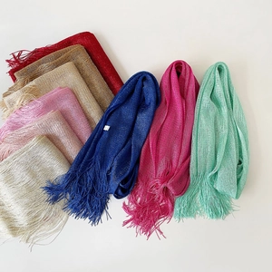 Sparkling metallic mesh shawls with fringes in various vibrant colors for weddings