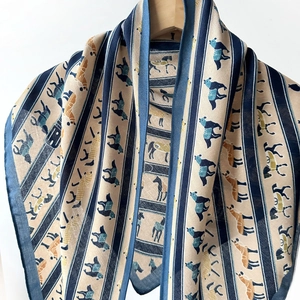 Vintage red horse print silk scarf with classic equestrian pattern on beige background