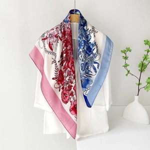 Detailed shot of 90cm satin square scarf with vintage floral prints on a white shirt