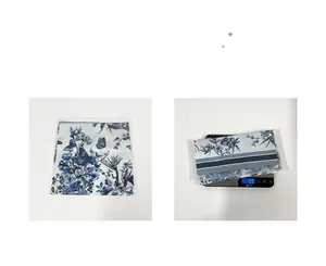 Detail showing high-quality twill silk scarf weighing 89g with blue butterfly patterns