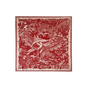 Detail of red and cream square silk scarf showing tropical forest print and white heron bird