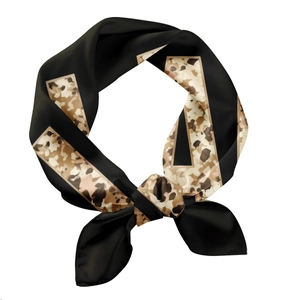 Black silk scarf featuring a stylized leopard print N pattern with a satin finish