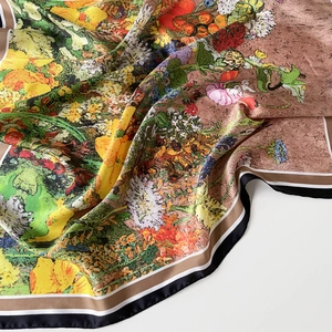 Detail of floral oil painting pattern on smooth satin silk scarf with contrast striped border
