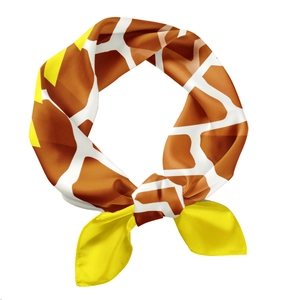 Fashionable silk scarf featuring giraffe print and yellow accents in a stylish loop knot