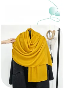 Detail showing ginger yellow faux linen shawl texture and elegant fabric weave