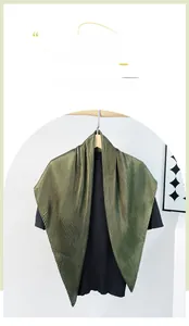 Close-up of a 90cm dark green pleated satin scarf used as a stylish headband or necktie
