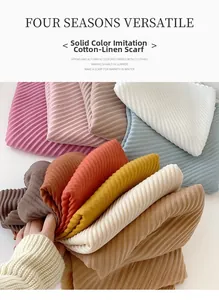 Stack of pleated faux cotton linen scarves in various solid pastel colors