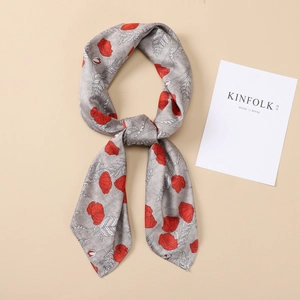 Elegant 90cm silk scarf with red floral poppy patterns on grey background flat lay view