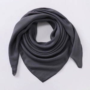 Deep grey pleated cotton-linen square scarf folded into a triangular shape for women
