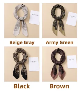 Close-up of four paisley silk scarves in beige-grey, army green, black, and brown