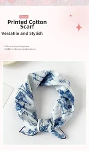 Close-up of a 58cm white cotton square scarf with blue vintage French floral print details