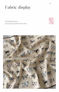 Dettaglio di un foulard in cotone con stampa equestre colorata su un tessuto color crema