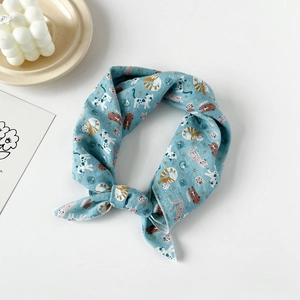 Close-up of cotton linen square scarf featuring cute hand-drawn cartoon cat patterns